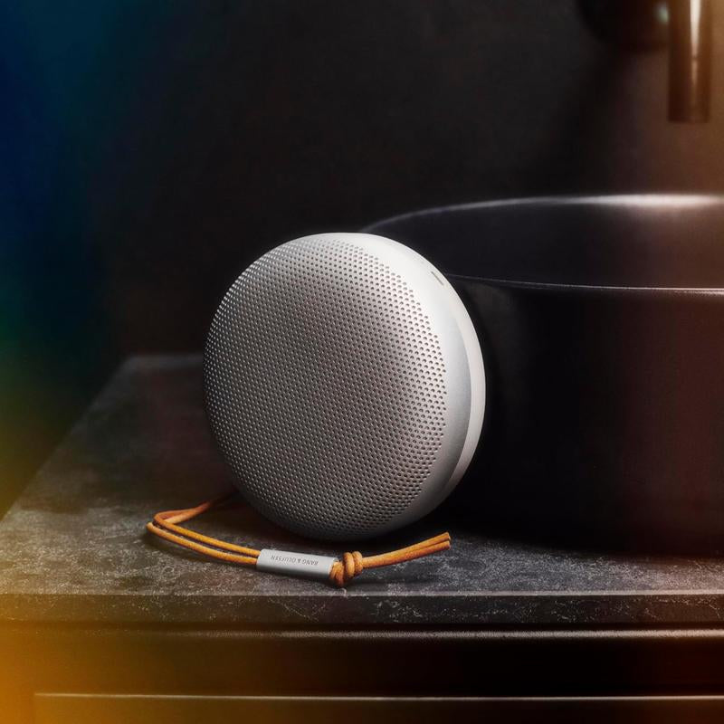 Experience Immersive Sound Anywhere with the Beosound A1 (2nd Generation) Waterproof Bluetooth Speaker in Grey Mist