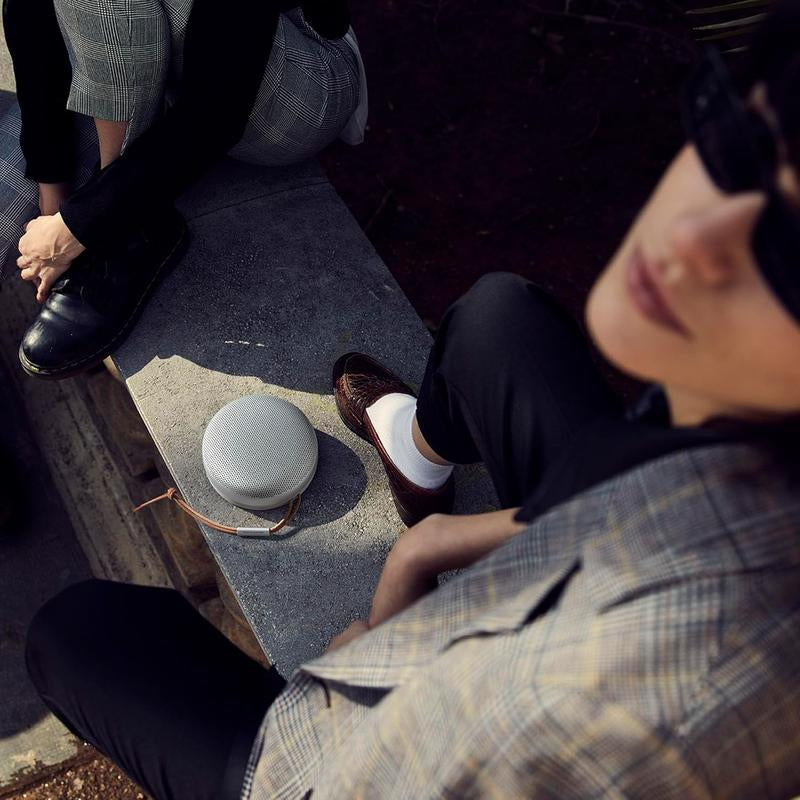 Experience Immersive Sound Anywhere with the Beosound A1 (2nd Generation) Waterproof Bluetooth Speaker in Grey Mist